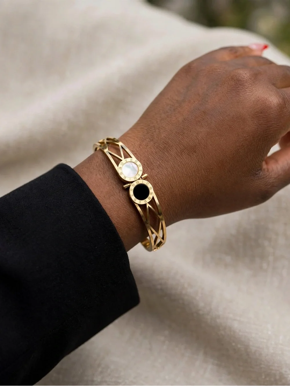 Gold Openwork Bangle with Mother-of-Pearl and Black Onyx Discs